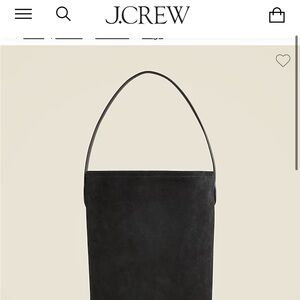 ￼ J.Crew authentic bucket purse. Never used has tag leather/ suede ,black.
